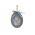 Decorative blue oval ornament with a gold bow on a white background